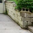 a collapsing retaining wall in Brattleboro