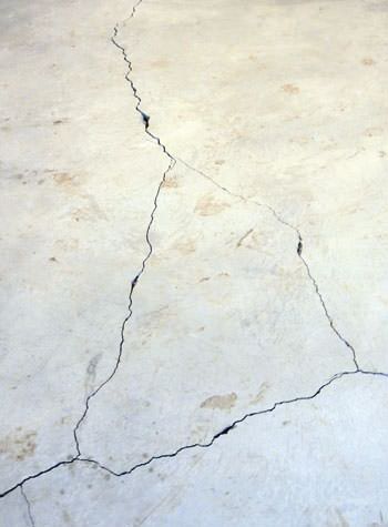 severely cracked, heaving slab floors in a home in Franklin