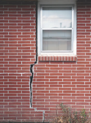 severe foundation wall cracks along a window in Lebanon