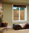 An egress window well installed within a finished basement space in Bennington.