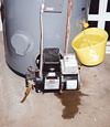A Springfield, Vermont and New Hampshire home with a flooding water heater