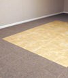 tiled and carpeted basement flooring installed in a Rutland home