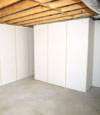 Fiberglass insulated basement wall system in Claremont, VT and NH