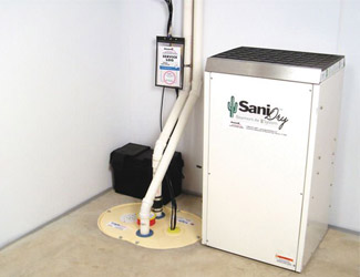 a complete basement waterproofing system installed in a Keene home