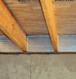 SilverGlo™ insulation installed in a floor joist in Montpelier