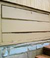 an old-fashioned crawl space door in Berlin about to be replaced