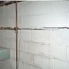 Severe foundation damage from a long crack in a bucking wall of a South Woodstock home.