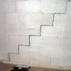 A diagonal stair step crack along the foundation wall of a Hanover home