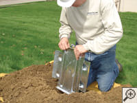 Steel earth anchor assembly installation in St. Albans.