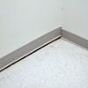 A partition wall separating from the floor in a Milton home.