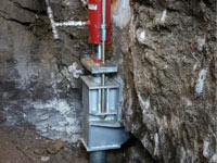 Foundation repair contractors lifting a structure in Concord.