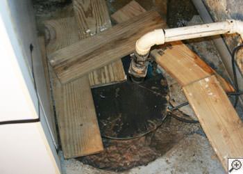 An ugly, clogged sump pump system in Plattsburgh, NY, Vermont and New Hampshire
