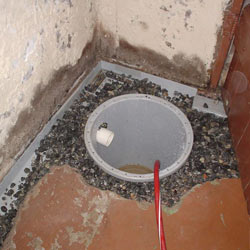 Installing a sump in a sump pump liner in a Keene home