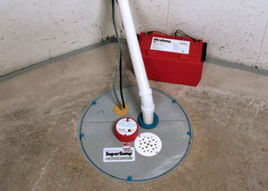 A sump pump system with a battery backup system installed in Middlebury