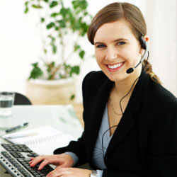 A disaster restoration customer service expert in Essex manning the phones