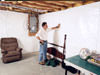 A basement wall covering for creating a vapor barrier on basement walls in St. Albans