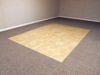 Tiled and carpeted basement flooring options for basement floor finishing in Colchester