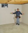 Plattsburgh, NY basement insulation covered by EverLast™ wall paneling, with SilverGlo™ insulation underneath