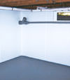 Keene, VT, NY and NH wet basement wall covering that tucks into a perimeter drainage system